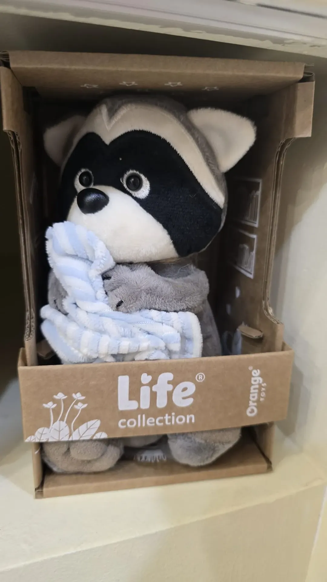 Peluche Mapache mantita celeste